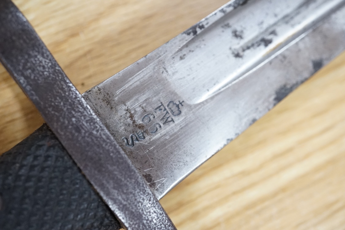 A Prussian M1865 bayonet and scabbard, blade marked with A&AS (for August & Albert Schnitzier), and Wilhelm I crown